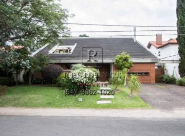 Foto 01 · Aluguel de Casa de 453m² com 3 Suítes e 4 Vagas no Condomínio Terra Ville em Porto Alegre-RS.