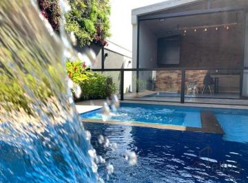 35dc067181b40b681e16226efdbf66eae2bda4de · Maravilhosa Casa Térrea 3 suítes + 1 reversível e piscina climatizada - Alphaville Nova Esplanada I