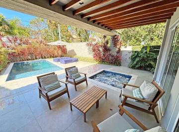b0de594d5c07fd30a5b28e4f46caa4f3e6c042b8 · Casa Reformada no Módulo 18 da Riviera de São Lourenço | 4 Suítes, Piscina e Próxima à Praia