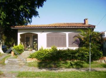 fachada · Casa à venda, 4 quartos, 1 suíte, churrasqueira, 350m² no bairro Alto Petrópolis.