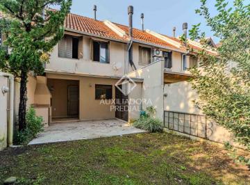 Casa · 106m² · 3 Quartos · 2 Vagas · Linda casa em condomínio com 3 dorm. suite lareira churr. garagem 2 carros