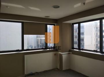 Comercial · 100m² · 4 Vagas · Conjunto comercial com vão livre e 2 vagas.
