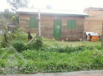 05 casa madeira · Terreno