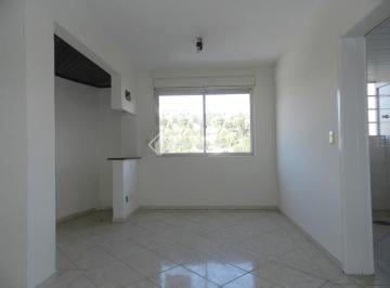 303934_iK1KK0d57KA2J43KNd3t_3039345da08fbc928d4.jpg · Apartamento amplo com sala 2 ambientes, 3 dormitórios e banho social. Uma vaga de garagem.