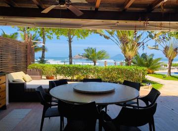 Imagem do Imóvel · Bela casa pé na areia, com vista para o Mar.