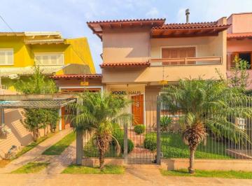 Casa · 187m² · 3 Quartos · 2 Vagas · Sobrado de 3 dormitórios sendo 1 suíte com sacada no Moinhos de Vento em Canoas