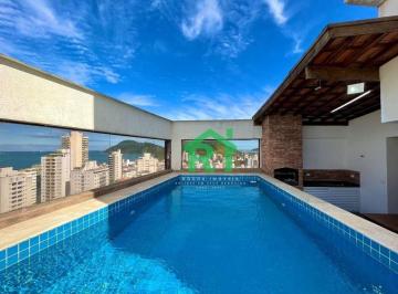 Piscina · Cobertura à venda na Praia das Astúrias I Rocha Imóveis Guarujá.
