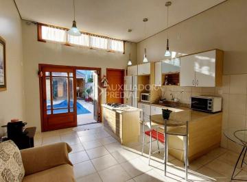 321407_iQ6N3Z_32140761453075a4001.jpg · Casa de 3 quartos, suíte, 4 vagas e piscina