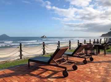Imagem do Imóvel · Casa em condomínio com área privativa pé na areia.