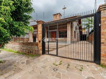 Casa · 156m² · 5 Quartos · 4 Vagas · Casa de 5 dormitórios estilo rústica em bairro de alto padrão em Canoas
