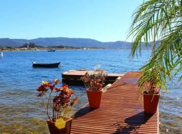 bbc3dba9dac5ae6c18b422cbb07354b953ce7259 · Casa com trapiche à venda na Lagoa da Conceição, Praia Mole, Florianópolis SC
