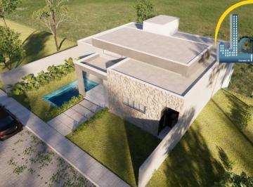 Foto 01 · Vendo casa duplex em Lauro de Freitas, condomínio com infra estrutura, 3 suítes, 300m², R$ 689.000,0