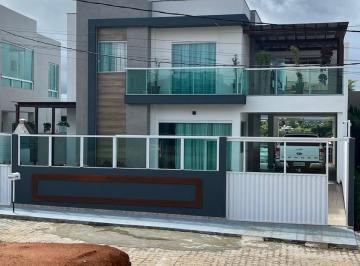 Foto 01 · Vendo casa em Lauro de Freitas, 3 suítes, 300m² de área de terreno, condomínio fechado, R$ 1.050.000