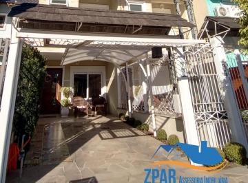 Foto 01 · Casa à venda em Porto Alegre-RS, bairro Hípica - 2 quartos, 1 suíte, 2 salas, 3 banheiros, 1 vaga, 1