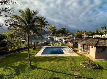 Casa · 580m² · 6 Quartos · 6 Vagas · Casa no Residencial Marina Guarujá no canal de Bertioga, litoral de São Paulo.