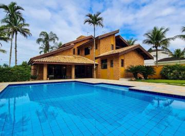 Casa · 490m² · 4 Quartos · 4 Vagas · Casa de esquina, frente praça, à venda no condomínio Jardim Acapulco no Guarujá