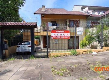 a401c136faa7fcc132726280d75171f4ce115d52 · Casa com 3 dormitórios para alugar, 396 m² por R$ 2.652,02/mês - Cavalhada - Porto Alegre/RS