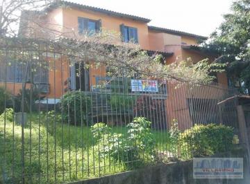 a4bbc72952aa511a86451395c64af18db1faa1d5 · Casa com 5 dormitórios à venda, 250 m² por R$ 648.000,00 - Cavalhada - Porto Ale
