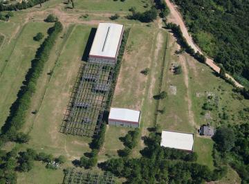 jexfrni2nzizzgiwmdnlowm5_md · Área industrial próximo à Castelinho plana com alguns barracões iniciados.