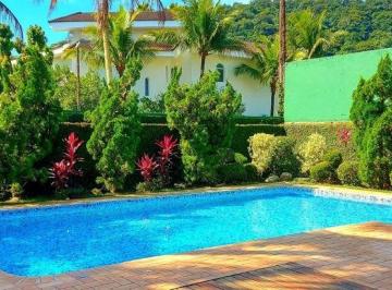 Casa · 390m² · 5 Quartos · 4 Vagas · Casa à venda no Jardim Acapulco em Guarujá.