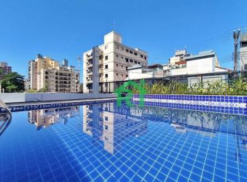 Piscina · Cobertura á venda na Praia do Tombo | Rocha Imóveis Guarujá