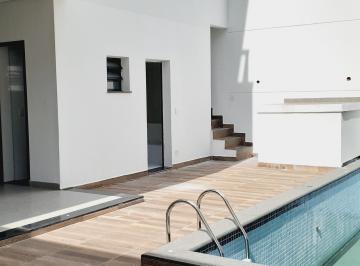Vista da sauna e piscina · Casa Alto Padrão São Paulo,, 4 suítes, Piscina, Sauna Privativa