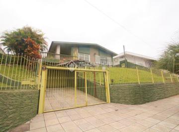 347036_i1FZ955a803py8o_347036610d8049e54bb.jpg · Casa com 5 dormitórios no bairro Cristo Rei