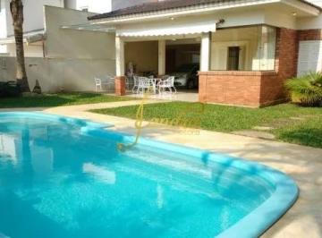 Casa · 350m² · 4 Quartos · 2 Vagas · Maravilhoso Sobrado em Atlântida na Região do Caburé! composto por 04 dormitórios, 02 suítes
