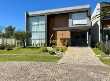 Casa · 250m² · 4 Quartos · 2 Vagas · Casa condomínio nova com 04 suítes mobiliado e decorado