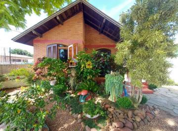 Casa · 5 Quartos · 1 Vaga · Terreno com 2 casas de alvenaria - Bairro Scharlau