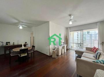Sala · Apartamento á venda na Praia das Pitangueiras | Rocha Imóveis Guarujá