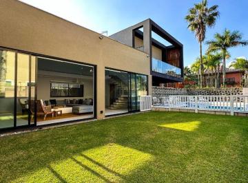 Casa · 420m² · 6 Quartos · 4 Vagas · Casa à venda no Jardim Acapulco, projeto contemporâneo, mobiliado e decorado.
