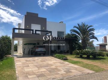 Casa · 210m² · 3 Quartos · 2 Vagas · Casa com 3 suítes em condomínio fechado Torres RS