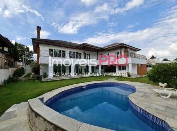 Casa · 750m² · 4 Quartos · 8 Vagas · Segurança e total conforto