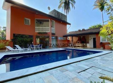 Área da piscina · Casa para venda e para temporada em Riviera de São Lourenço