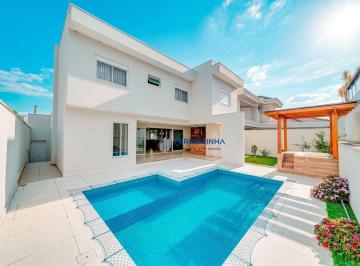 Casa · 370m² · 4 Quartos · 2 Vagas · Casa com 4 dormitórios, 370 m² - venda por R$ 4.500.000,00 ou aluguel por R$ 22.650,00/mês - Condomí