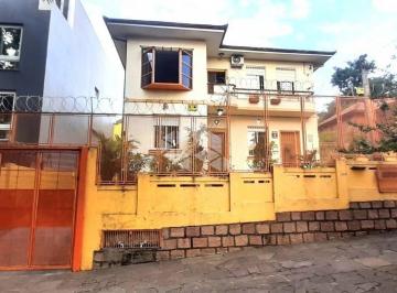 236399_i6708_236399627ee8de0d80c.jpg · Casa em área total de 643,48 metros quadrados no bairro Menino Deus a venda, a metros do Mãe de Deus