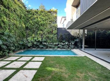 5bad0f6cdddeca6dd025e27ed697e8bf091dbd4e · Casa nova Jardim América com 4 suítes, 4 vagas e Lazer