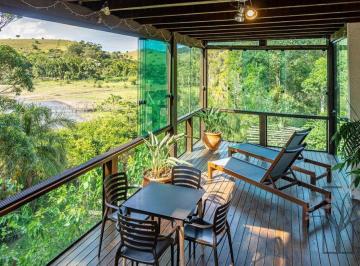 Casa · 300m² · 3 Quartos · 6 Vagas · Casa de Praia Rústica e Contemporânea à Beira da Água, Lagoa de Ibiraquera