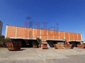 Comercial · 9390m² · Galpão Industrial de 7.689m² com Ampla Infraestrutura Administrativa e Pé Direito de 12 metros