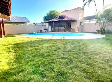 Casa · 220m² · 4 Quartos · 2 Vagas · Casa em Atlântida perto mar, com 04 dormitórios e  piscina