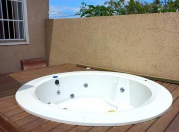 Apartamento · 82m² · 2 Quartos · 2 Vagas · geminada de 02 dormitórios com jacuzzi em  tramandaí
