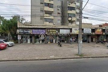 379710_id6BN1Wt886B454Z9tD4_37971062da9cd5f01bd.jpg · Comercial no bairro Partenon