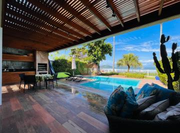 Imagem do Imóvel · A casa dos seus sonhos em um condomínio exclusivo na paradisíaca praia de Juquehy.