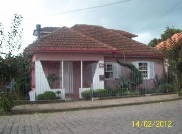 ab7ea47bc0e81246fa3345182aa241ba93ba388a · Casa em ótimo terreno com excelente potencial construtivo, Centro - Canela - CA0624.