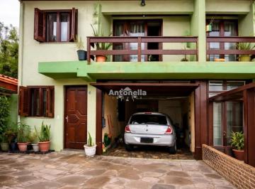Casa · 100m² · 3 Quartos · 1 Vaga · Amplo sobrado no Bairro Charqueadas