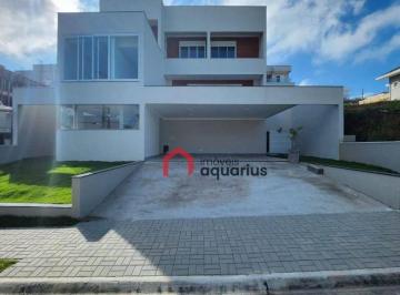 41d6ecd87ecf6ed1c72e1e7a2b3ac3cb05fbf264 · Casa com 3 dormitórios à venda, 370 m² por R$ 3.080.000,00 - Condomínio Residencial Jaguary - São Jo