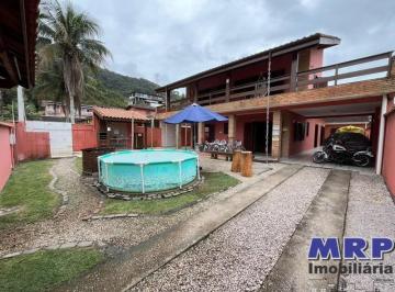 Foto 01 · Casa em Ubatuba com 4 suítes + edícula nos fundos. Condomínio fechado na Praia da Lagoinha