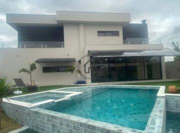 Piscina · Casa 4 suítes no Swiss Park em Campinas.