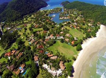 Foto 01 · EXCLUSIVA CASA DE FRENTE PARA O CANAL NO COND LARANJEIRAS PARATY